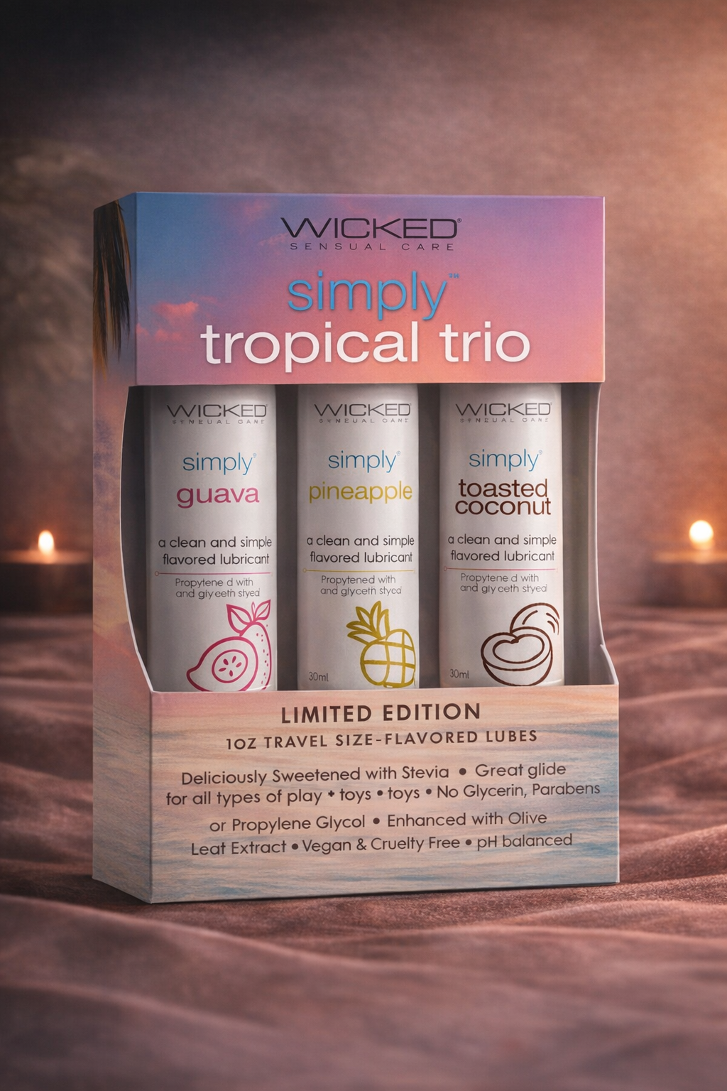 Bare Intentions Wicked Simply Tropical Trio vape juice bottles with colorful labels and tropical fruit illustrations.