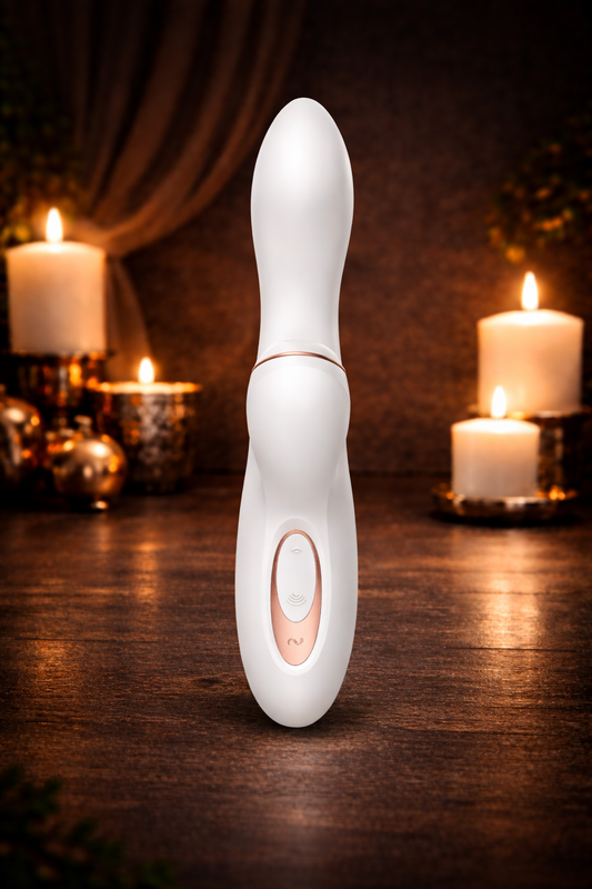 NOVA Pulse dual stimulator by Bare Intentions, showing sleek control unit with dual vibrators and adjustable settings.