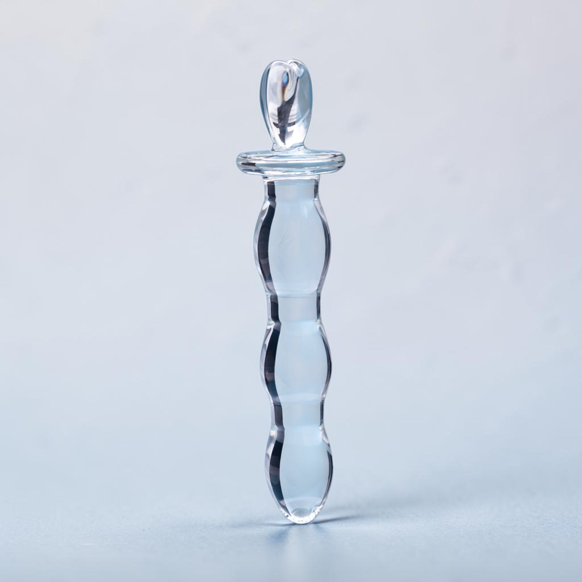 Bare Intentions Hera's Cascade jewelry piece featuring cascading silver chains and intricate design details.