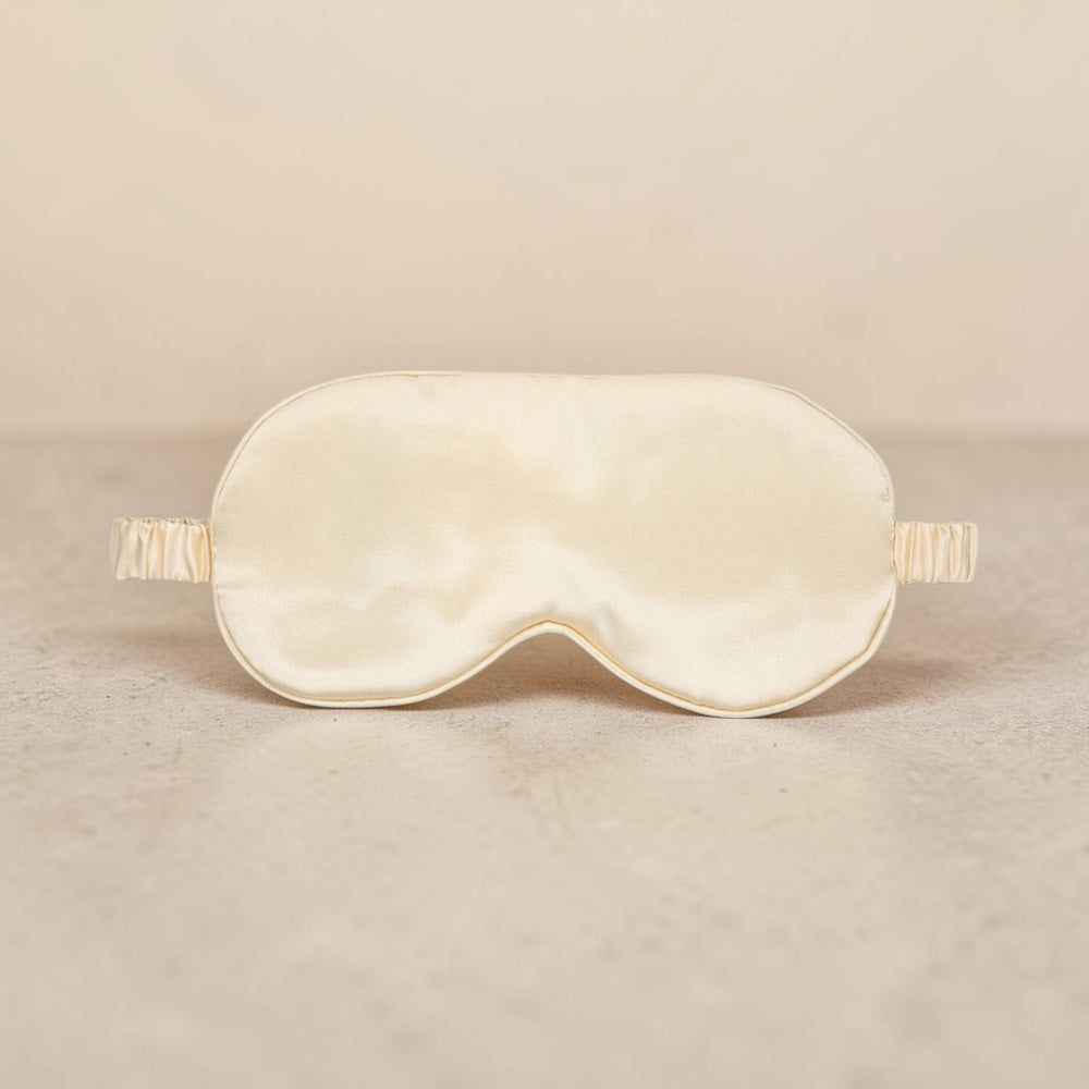 Luxury satin gold mask by Bare Intentions, featuring smooth satin fabric and elegant design for stylish wear.