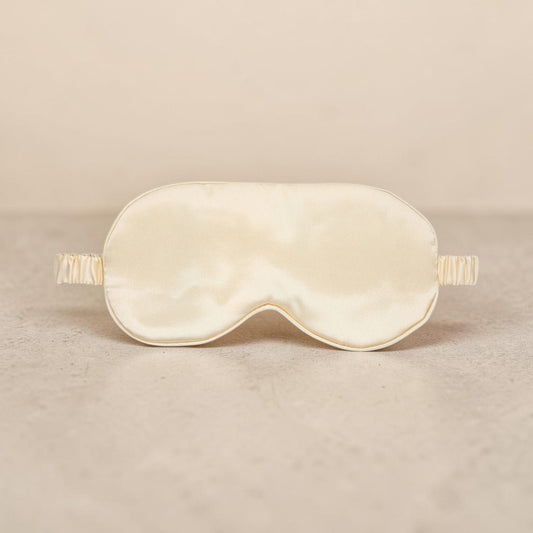 Luxury satin gold mask by Bare Intentions, featuring smooth satin fabric and elegant design for stylish wear.
