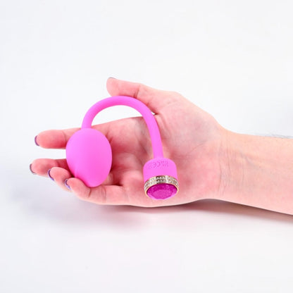Bare Intentions Pretty in Pink Sugar vibrating egg, pink personal massager with control button, smooth and discreet design.
