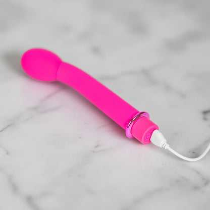 Bare Intentions KORA Fiercely Powerful G and P spot vibrator shown in sleek design with textured surface and ergonomic shape.