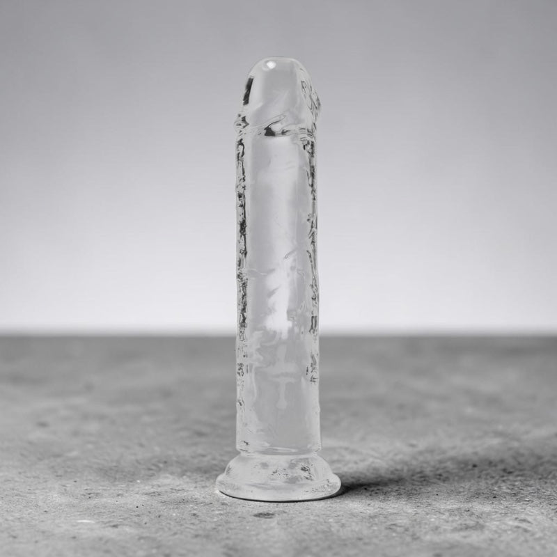 Clear 7-inch crystal glass from Bare Intentions with smooth, polished edges, ideal for elegant beverage presentation.